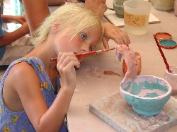 enfant poterie
